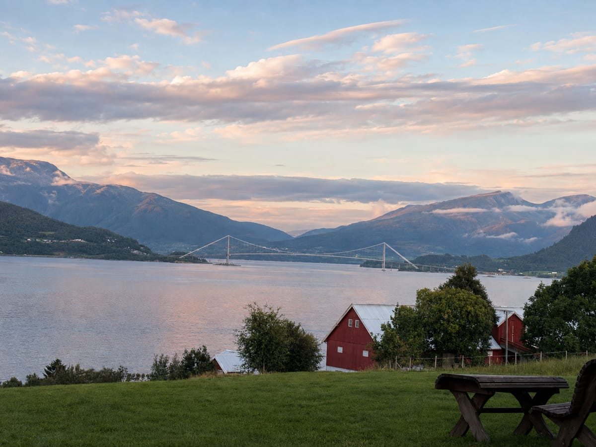 Bench and picnic table looking out over the fjord towards the Krifast bridge