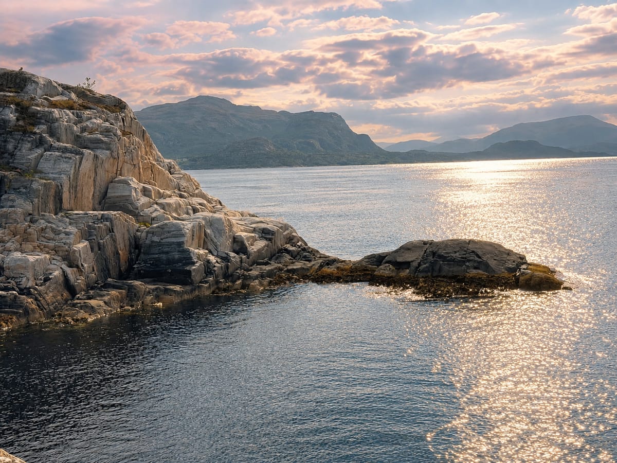 Sunlight on the sea between coastal rocks near Kristiansund